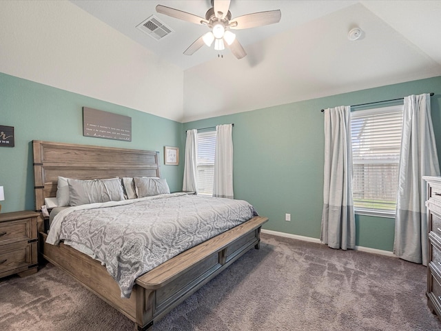 bedroom with carpet floors, lofted ceiling, visible vents, and multiple windows