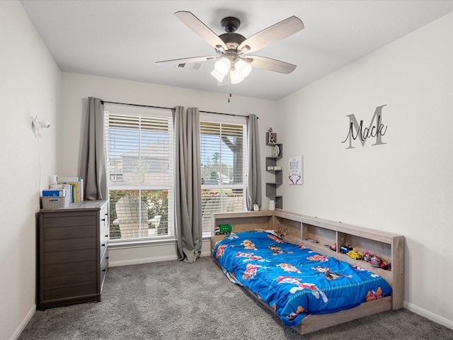 bedroom featuring a ceiling fan, carpet, visible vents, and baseboards