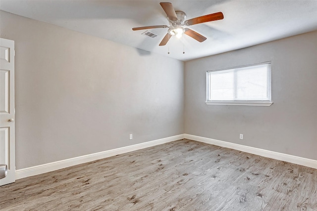 unfurnished room featuring ceiling fan and light hardwood / wood-style flooring