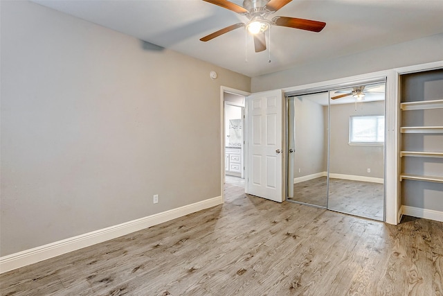 unfurnished bedroom with ceiling fan and light hardwood / wood-style floors