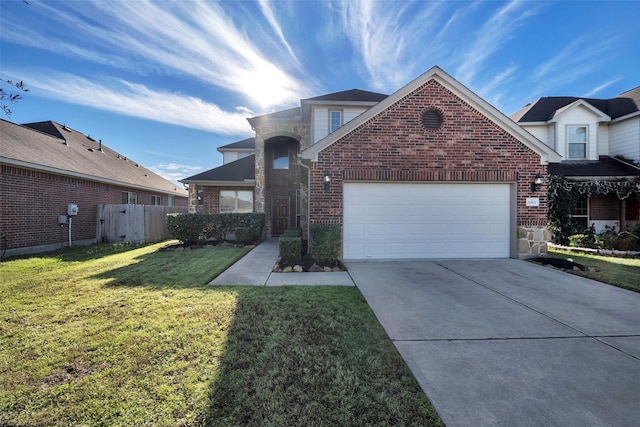 front facade featuring a front yard and a garage