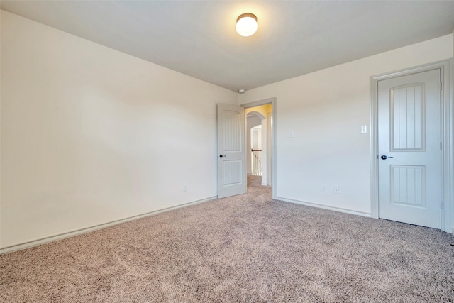 spare room with carpet floors