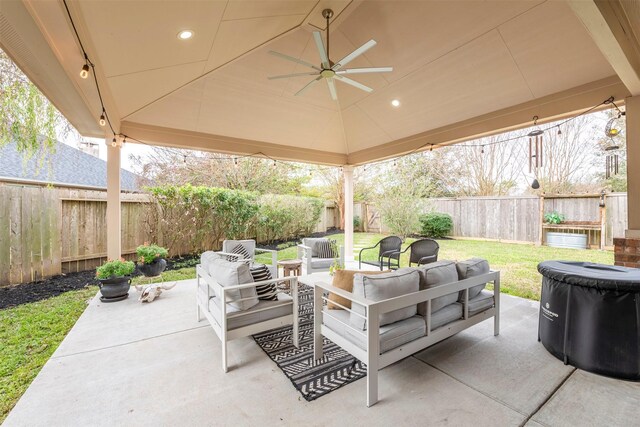 view of patio / terrace featuring ceiling fan, an outdoor hangout area, and a gazebo