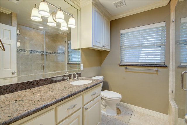 bathroom with toilet, tile patterned flooring, an enclosed shower, ornamental molding, and vanity