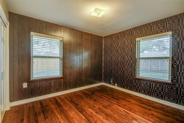 empty room featuring hardwood / wood-style floors