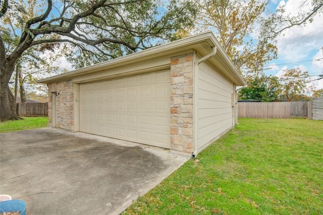 garage featuring a yard