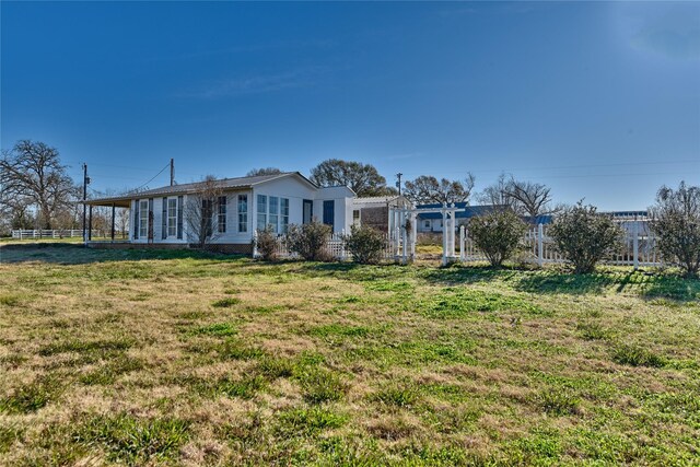 view of front of property with a front lawn