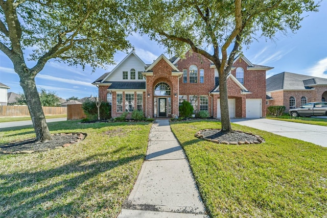 front facade with a front lawn and a garage