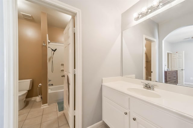 full bathroom with tile patterned flooring,  shower combination, vanity, and toilet