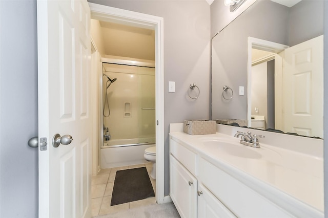 full bathroom featuring vanity, tile patterned flooring, toilet, and bathing tub / shower combination