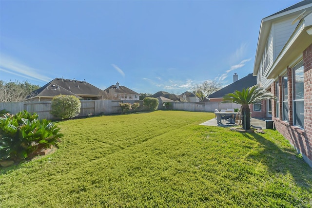 view of yard with a patio area