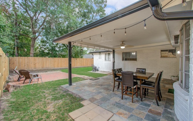 view of patio with ceiling fan