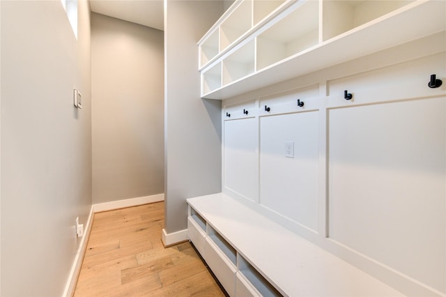 mudroom with light hardwood / wood-style flooring