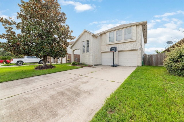 view of front property featuring a front lawn and a garage