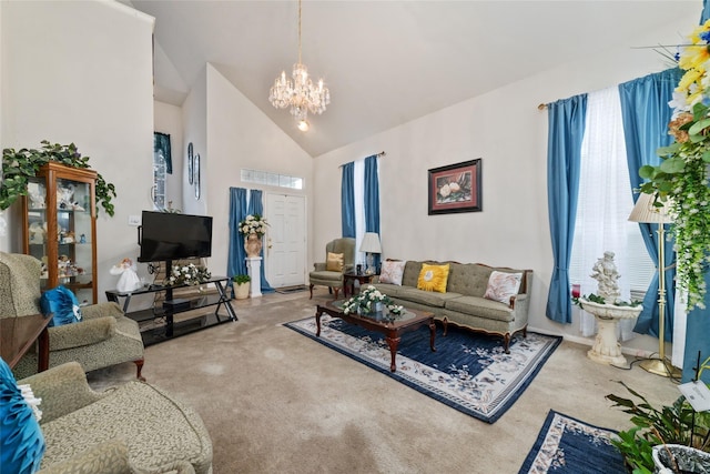 living room featuring high vaulted ceiling, an inviting chandelier, and carpet