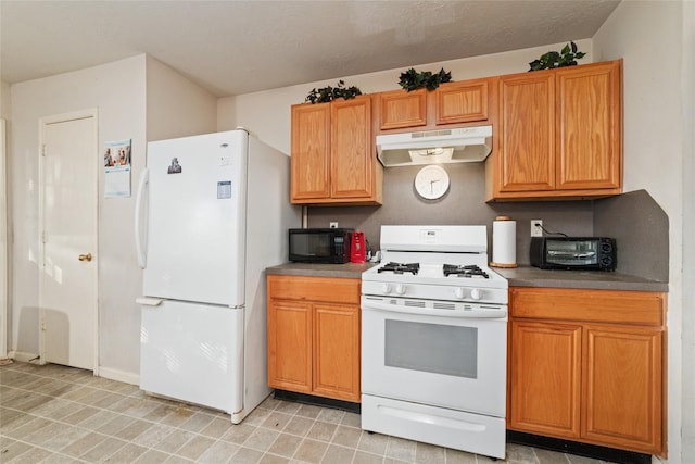 kitchen featuring white appliances