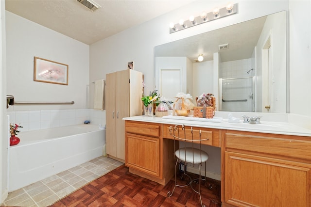 bathroom with vanity, parquet flooring, and plus walk in shower