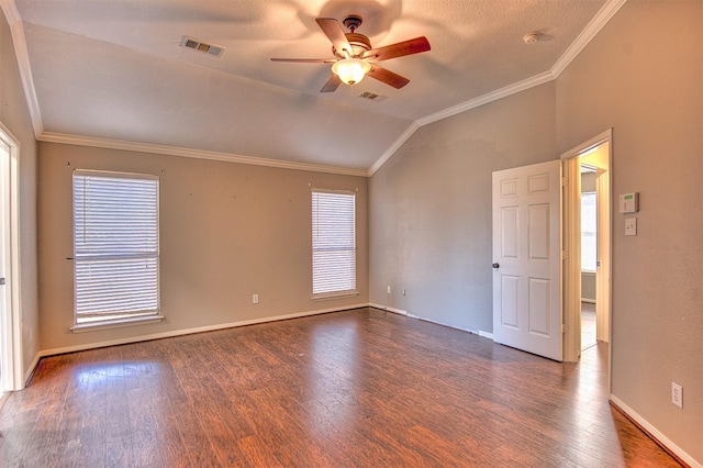 unfurnished room featuring ornamental molding, dark wood-type flooring, ceiling fan, and vaulted ceiling