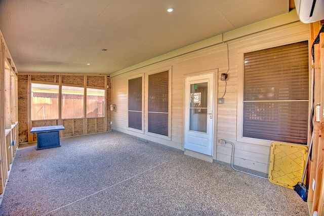 unfurnished sunroom with vaulted ceiling