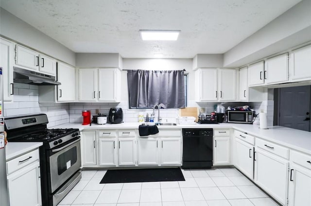 kitchen with sink, stainless steel appliances, and white cabinetry