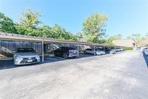 view of parking with a carport