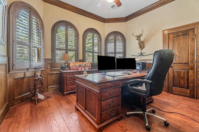 office area with ceiling fan, hardwood / wood-style floors, plenty of natural light, and crown molding