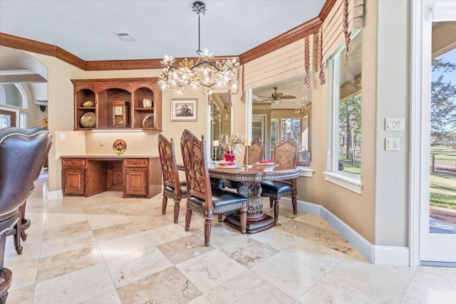 dining area with ceiling fan with notable chandelier and ornamental molding