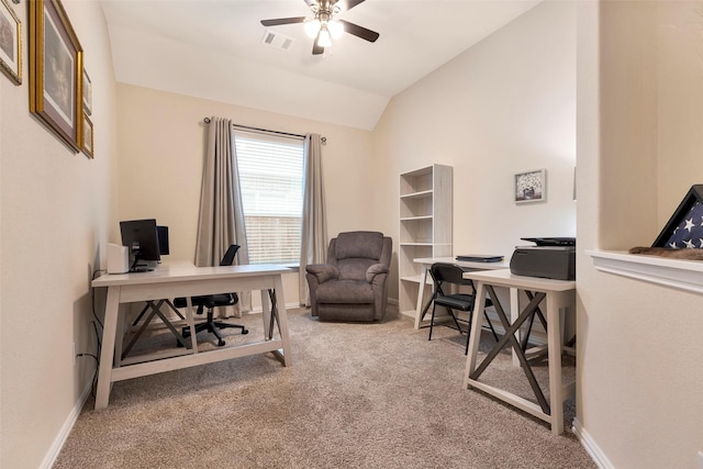 office area featuring vaulted ceiling, carpet floors, and ceiling fan