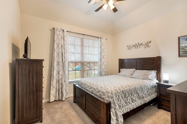 bedroom featuring light carpet and ceiling fan