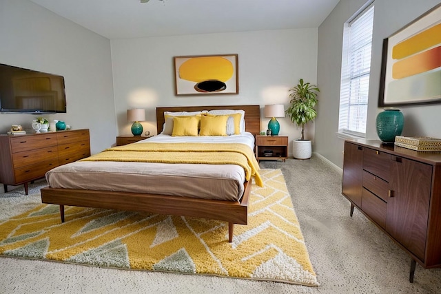 bedroom with light carpet