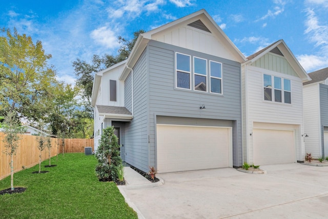 view of front of house featuring a front yard and a garage