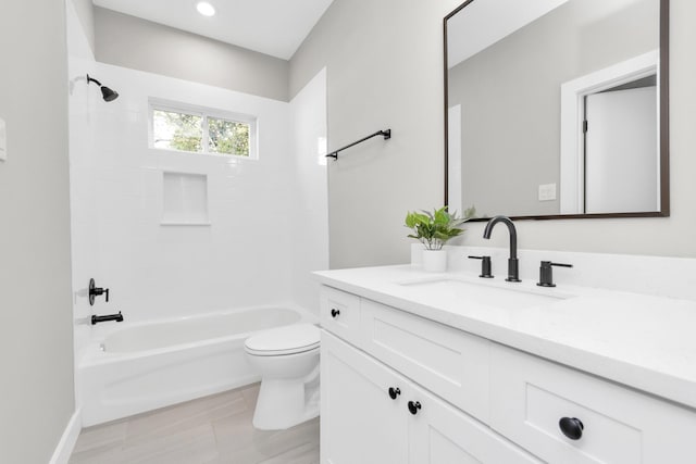 full bathroom featuring toilet, vanity, and shower / bathtub combination