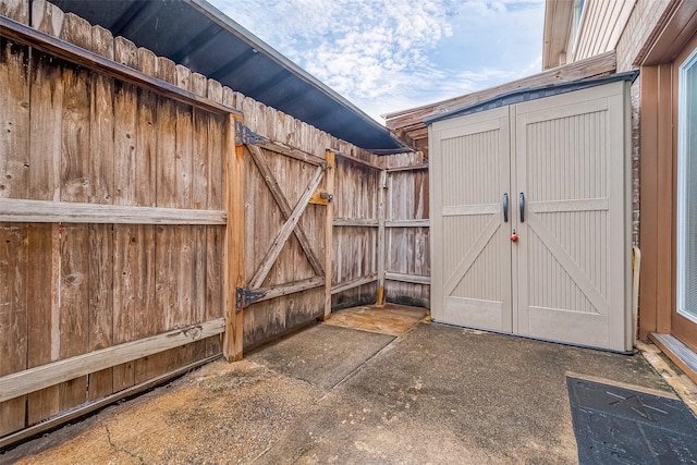 exterior space with a storage shed