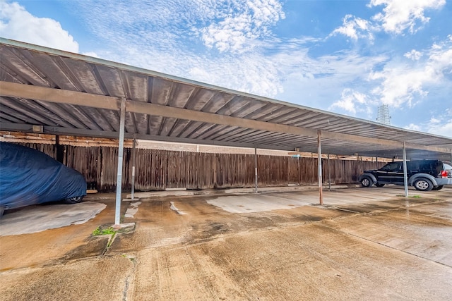 view of car parking with a carport