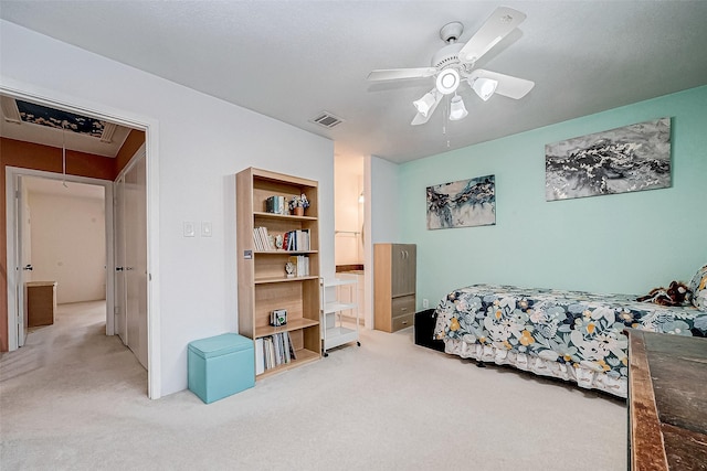 bedroom featuring ceiling fan and carpet flooring