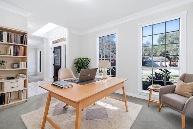 carpeted office with crown molding