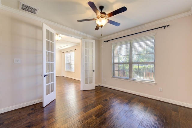 unfurnished room with baseboards, french doors, hardwood / wood-style flooring, and visible vents