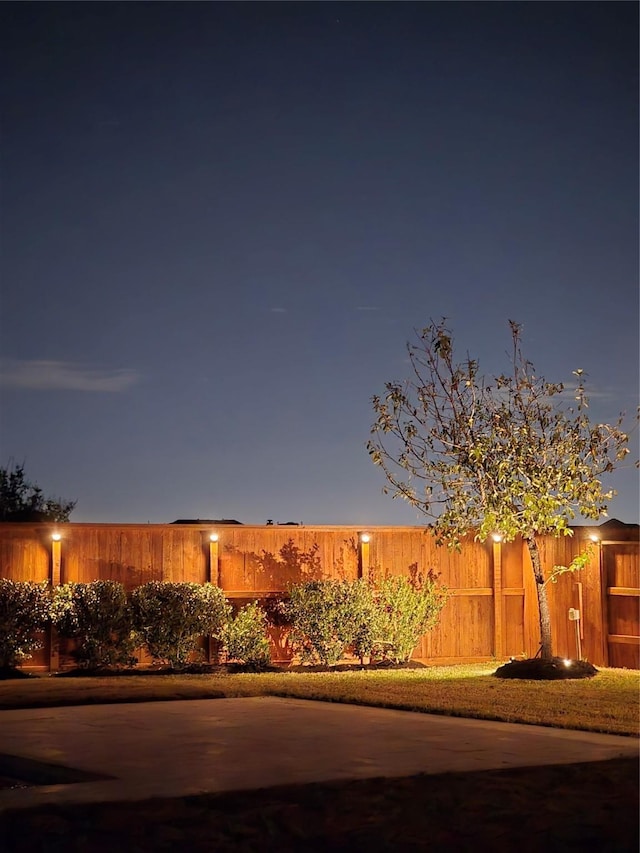 view of yard with fence