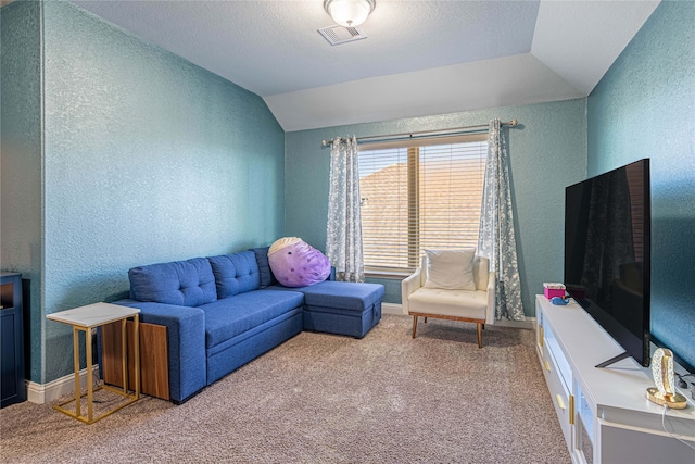 carpeted living room featuring lofted ceiling