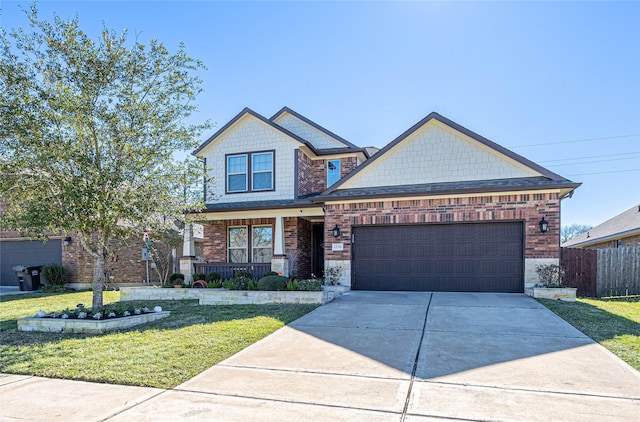 craftsman inspired home featuring a front lawn, a garage, and a porch