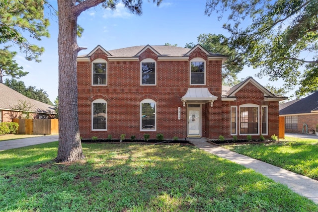 view of front of house with a front yard