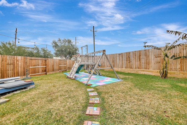 view of yard featuring a playground