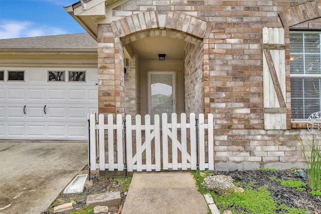 property entrance featuring a garage