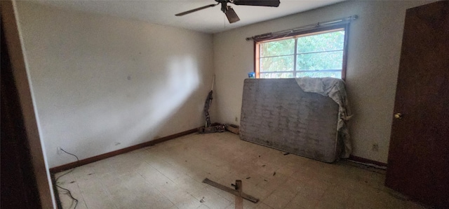 unfurnished room featuring ceiling fan