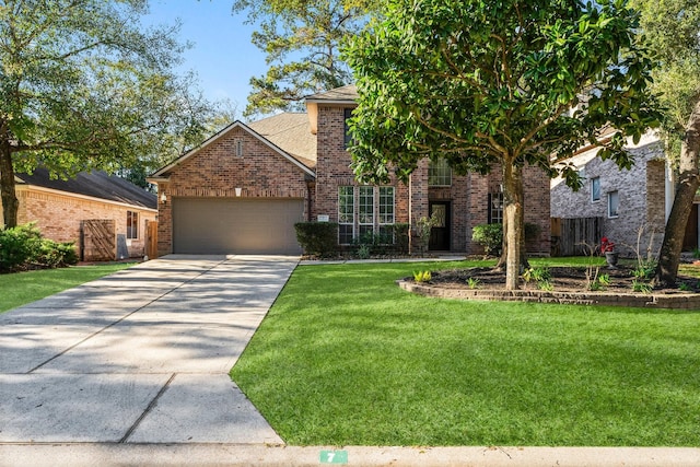 view of front of home with a front lawn and a garage