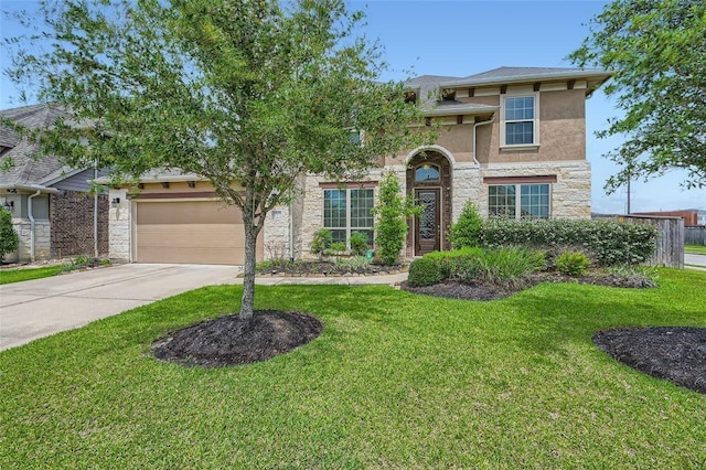 view of front of home with a garage and a front yard