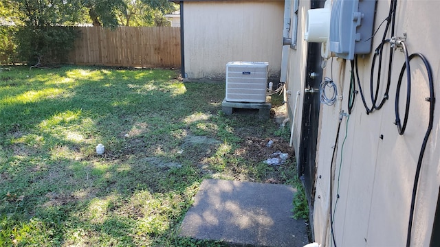 view of yard featuring central AC