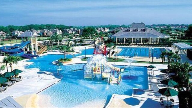 view of swimming pool featuring a water slide