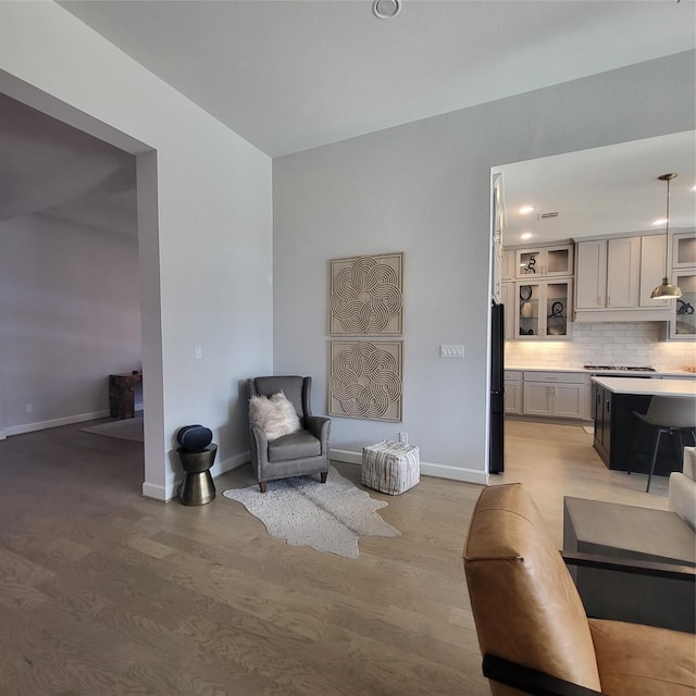 sitting room featuring light wood-type flooring