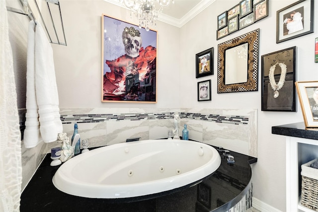 bathroom with a washtub, ornamental molding, and a chandelier